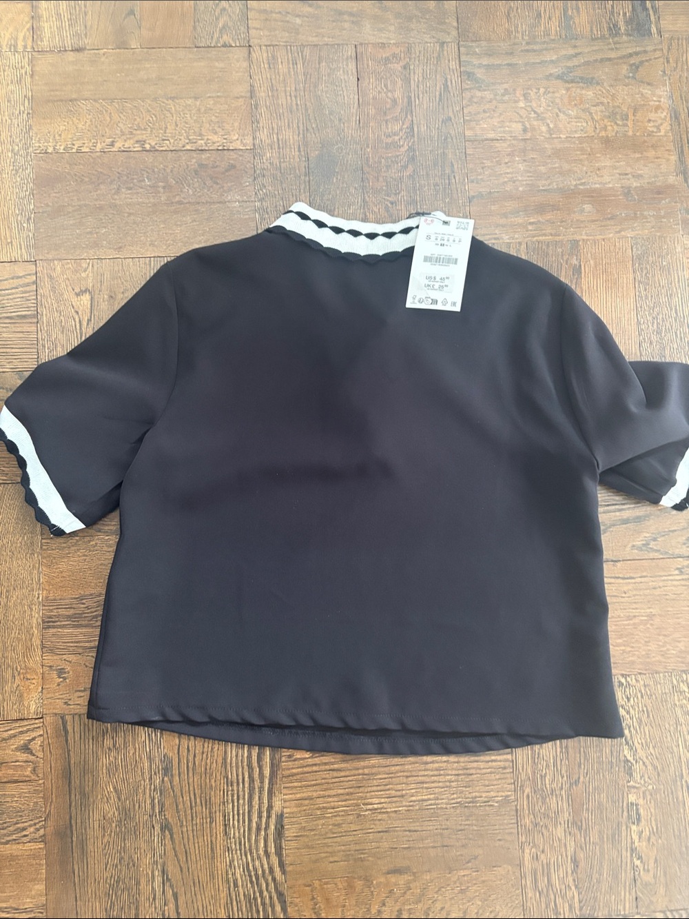 Zara combination polo top 
Black Short Sleeve Top with White Scalloped Trim